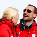 11 March: Crown Prince Haakon and Crown Princess Mette-Marit on the Royal stand during the world cup ski jump in Holmenkollen (Photo: Erlend Aas / Scanpix)